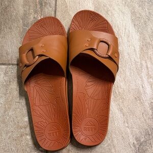 Reef Tan Slide Sandals with Embossed Design